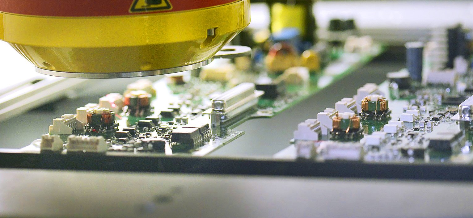 Investigating a drive's component in ABB laboratory