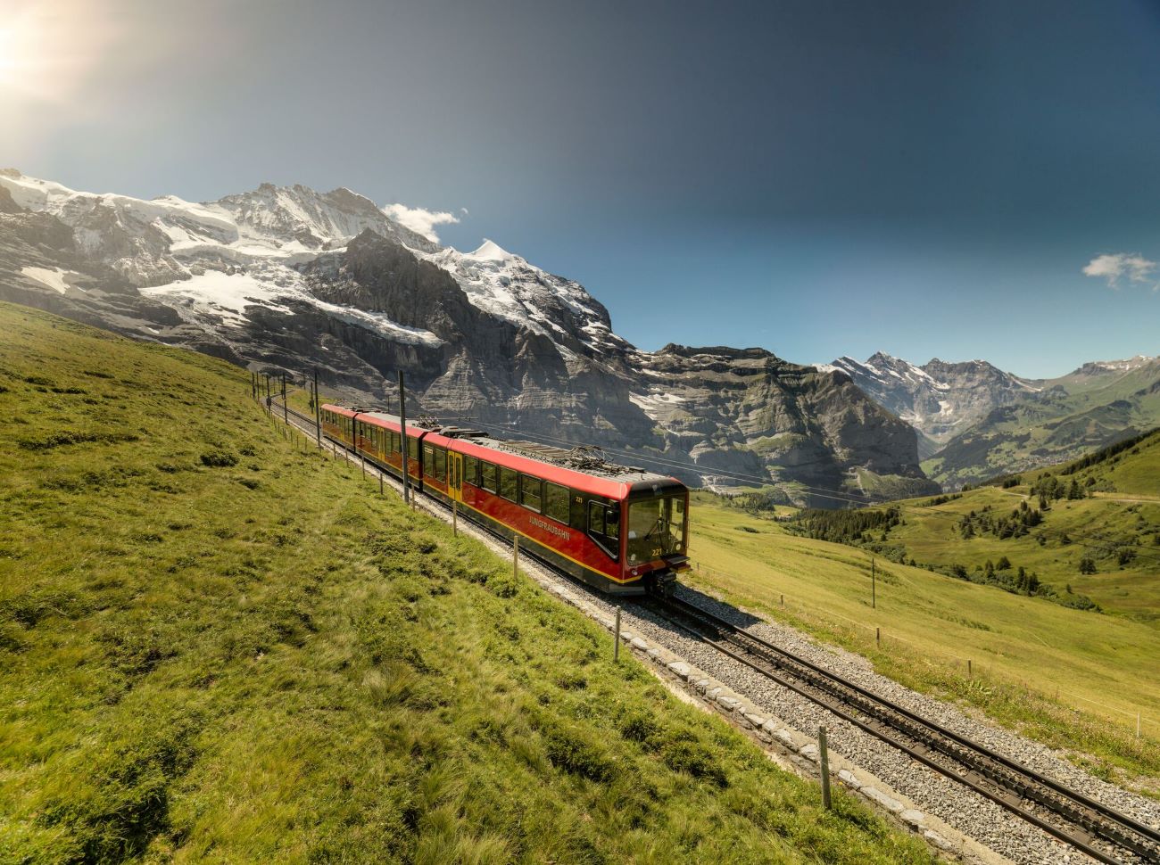 a red train in the mountain