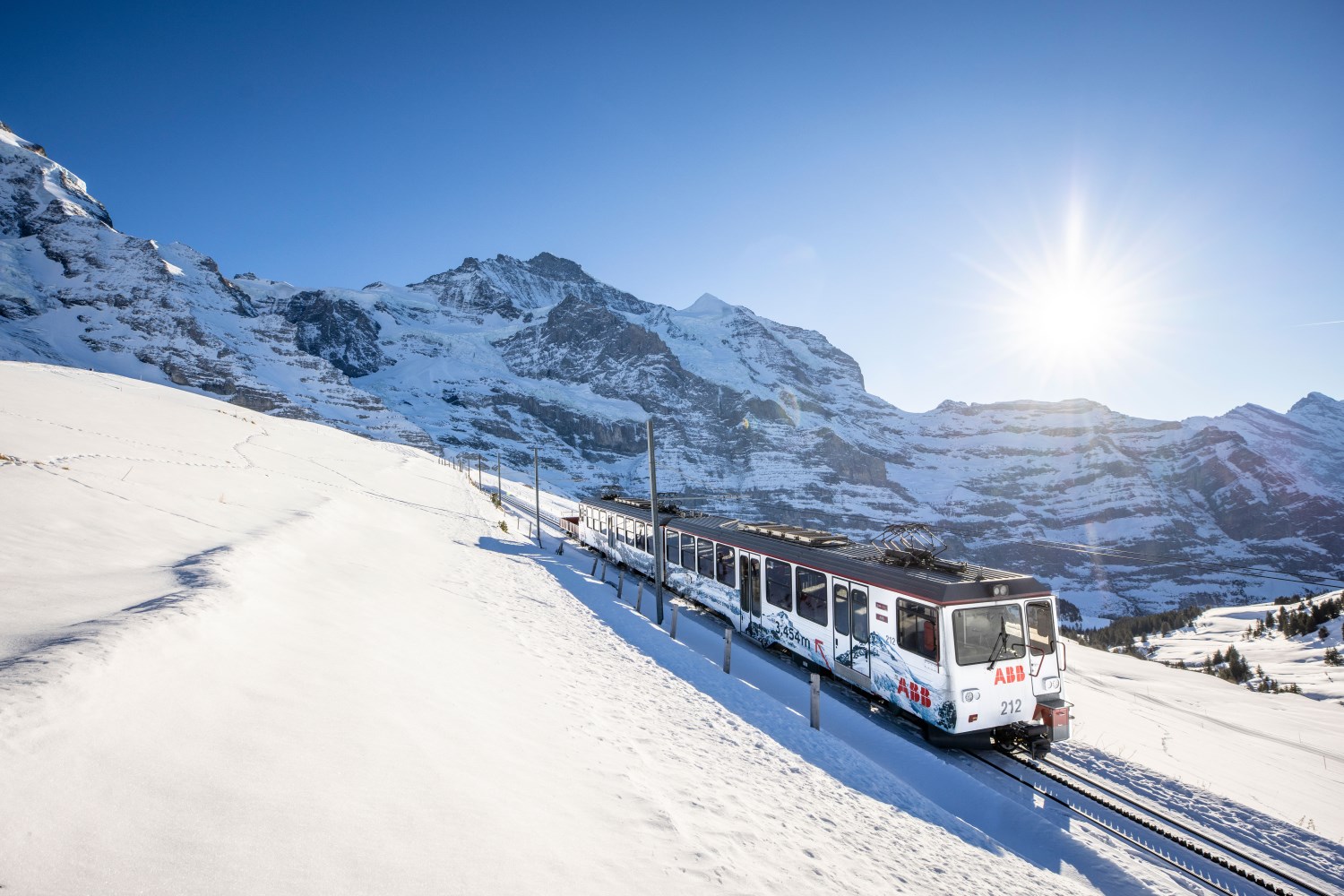 Train in the snow mountain