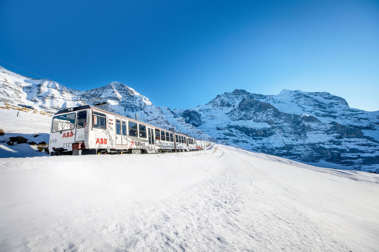 ABB-branded Jungfraubahn in Swiss Alps - front counter angle-Medium